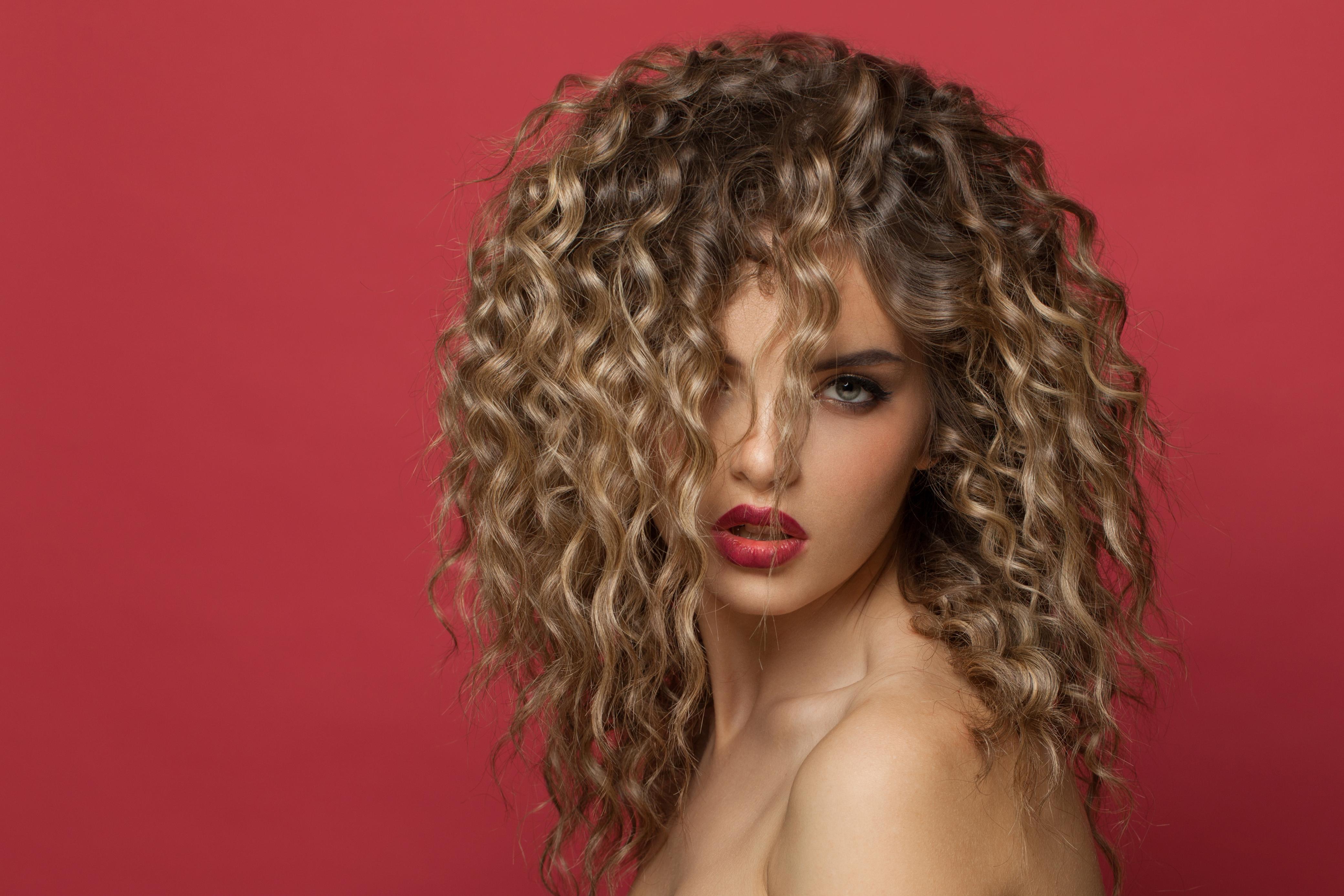 Bold curly blonde styling