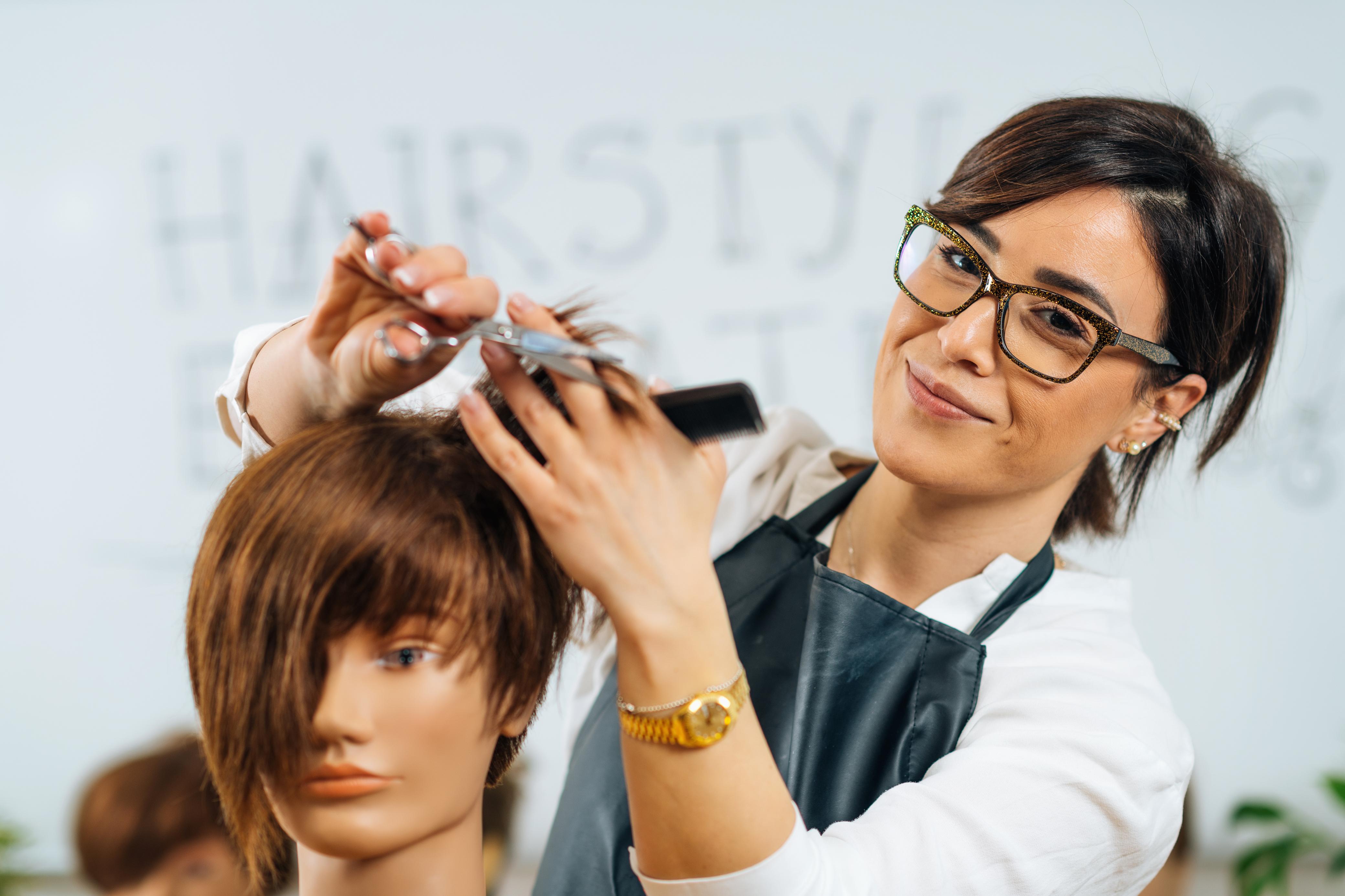 Threading specialist working on facial hair shaping